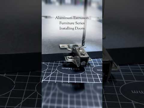 Installing a cabinet door on 20 series aluminum extrusion with stainless steel hinges — video